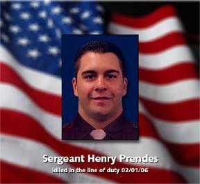 Sgt Henry Prendes with Flag.JPG